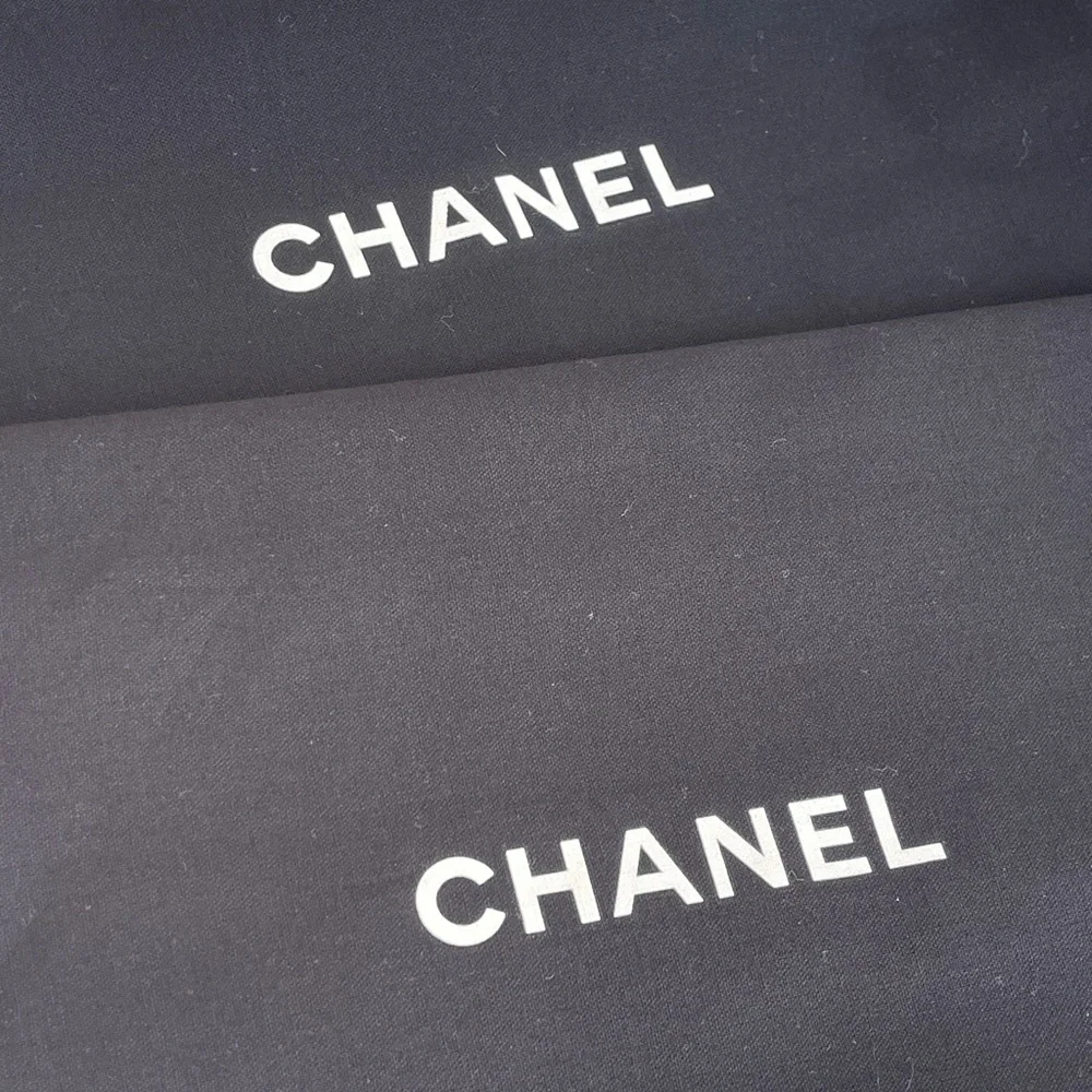 Pair Of Chanel Dust Bags